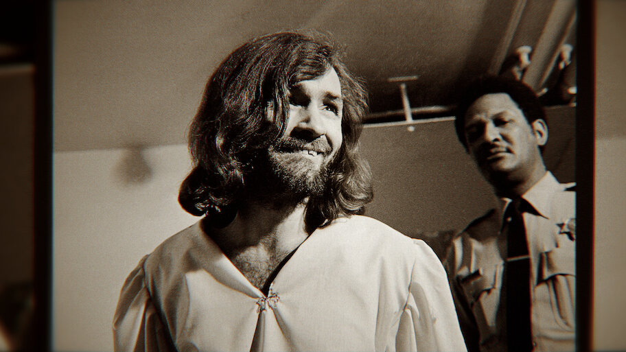 Documented media photograph of convicted criminal Charles Manson inside a correctional facility.
