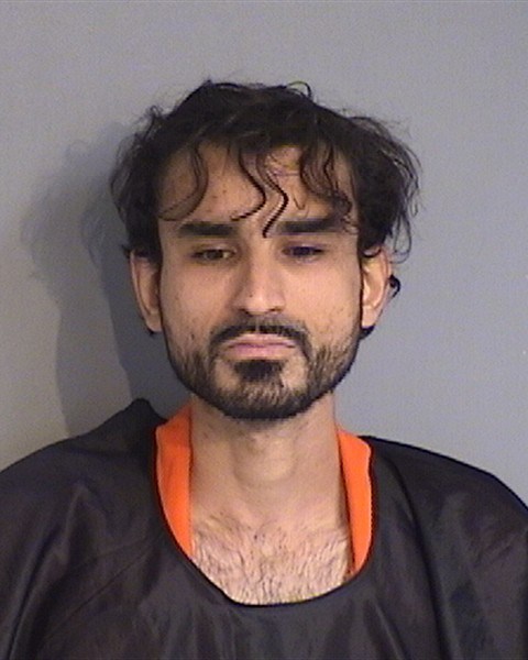 Mugshot of Ahmad Jihad Bojeh looking directly into the camera against a neutral background.