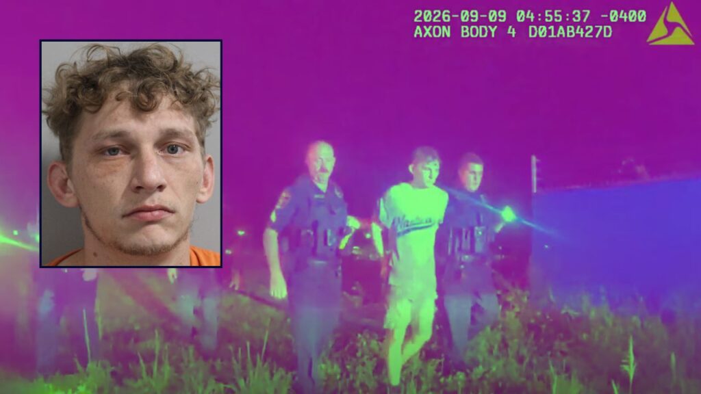 A police bodycam perspective showing deputies arresting Isaac Kinsey in a dense, swampy environment, with a small square inset of his booking mugshot in the corner.